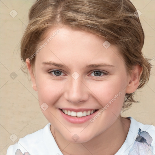 Joyful white child female with medium  brown hair and brown eyes