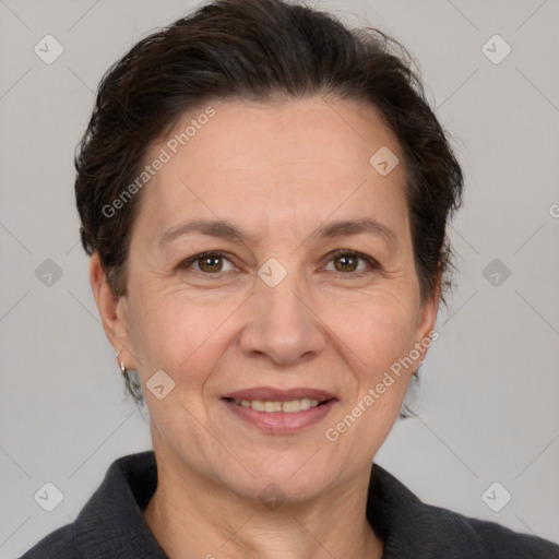 Joyful white adult female with short  brown hair and brown eyes