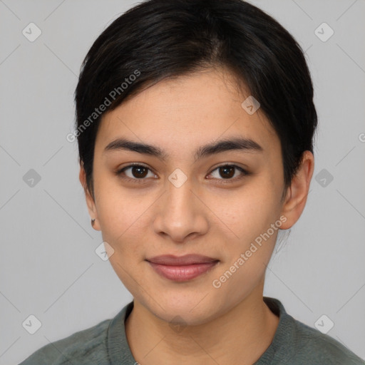 Joyful asian young-adult female with short  black hair and brown eyes