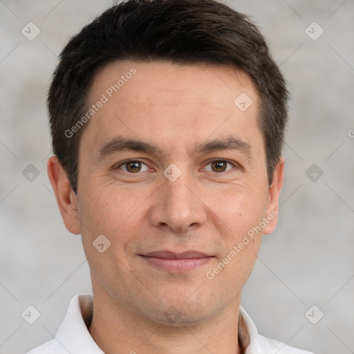 Joyful white adult male with short  brown hair and brown eyes