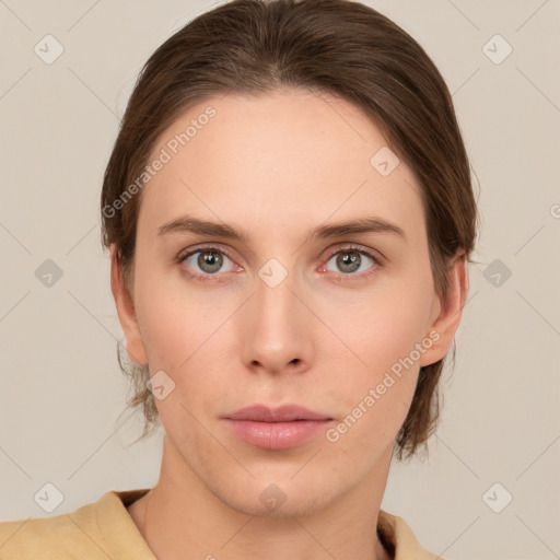 Neutral white young-adult female with medium  brown hair and grey eyes