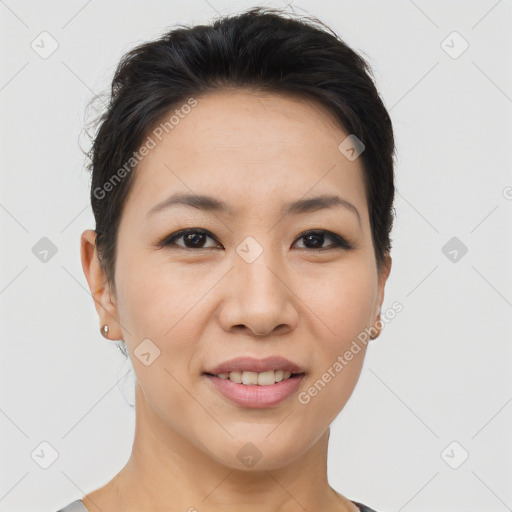 Joyful asian young-adult female with short  brown hair and brown eyes