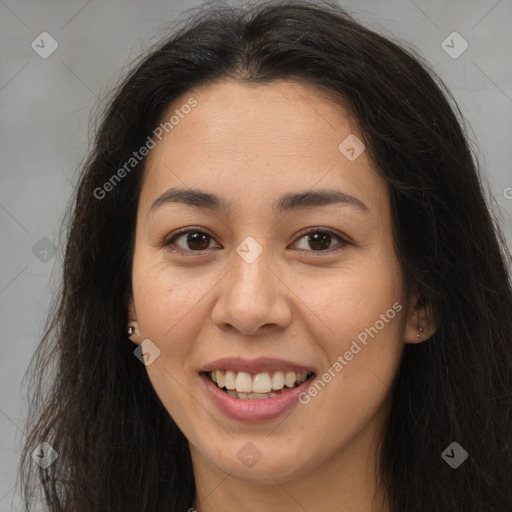 Joyful latino young-adult female with long  brown hair and brown eyes