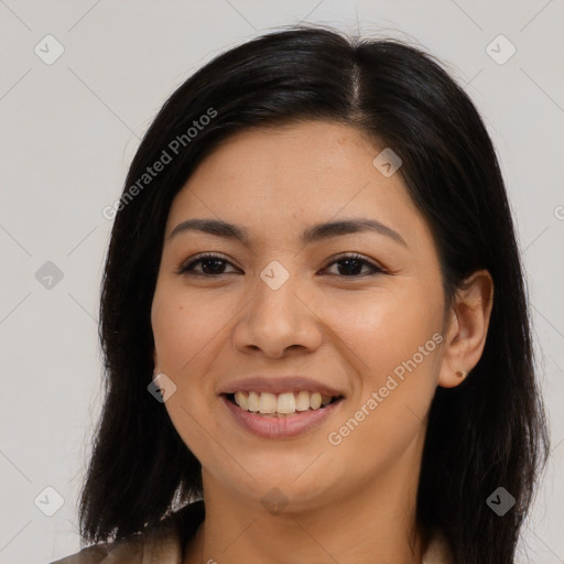 Joyful asian young-adult female with long  brown hair and brown eyes