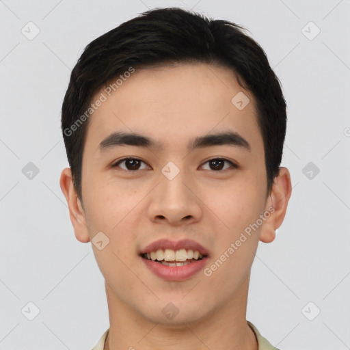 Joyful asian young-adult male with short  brown hair and brown eyes