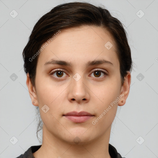 Neutral white young-adult female with short  brown hair and brown eyes