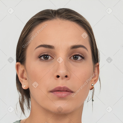 Neutral white young-adult female with medium  brown hair and brown eyes