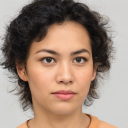 Neutral asian young-adult female with medium  brown hair and brown eyes