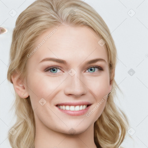 Joyful white young-adult female with long  brown hair and blue eyes