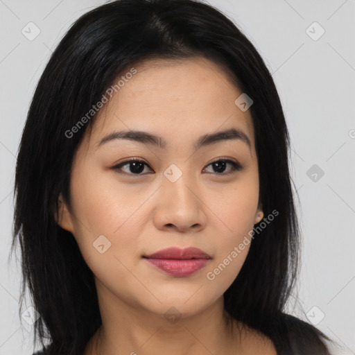 Joyful asian young-adult female with medium  black hair and brown eyes