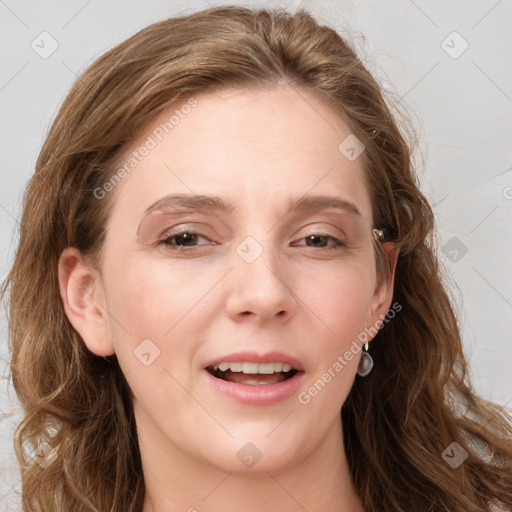 Joyful white young-adult female with long  brown hair and blue eyes