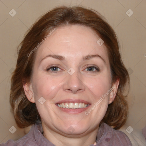 Joyful white adult female with medium  brown hair and blue eyes