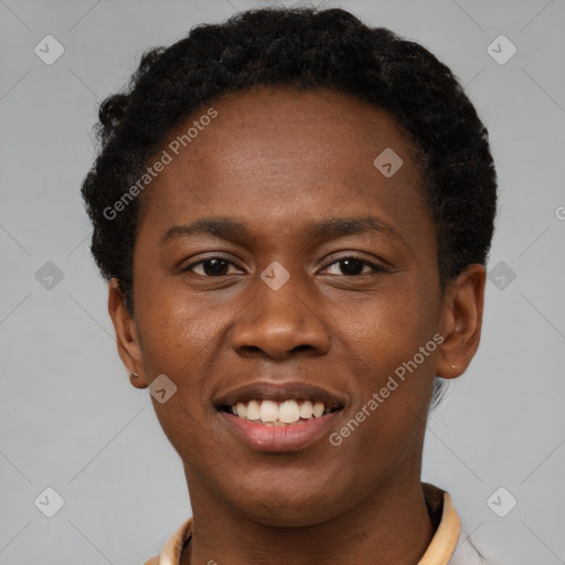 Joyful latino young-adult male with short  brown hair and brown eyes