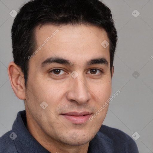 Joyful white adult male with short  brown hair and brown eyes