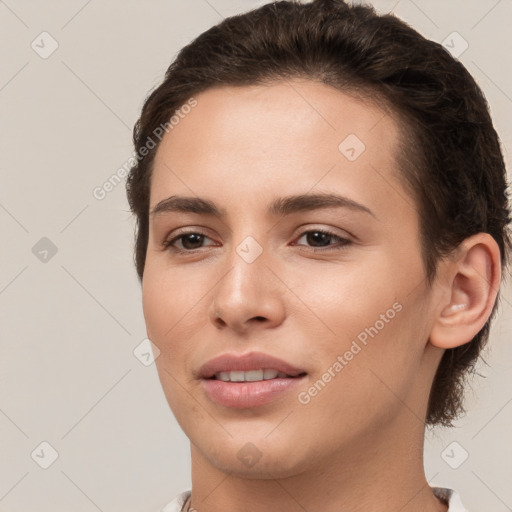 Joyful white young-adult female with short  brown hair and brown eyes