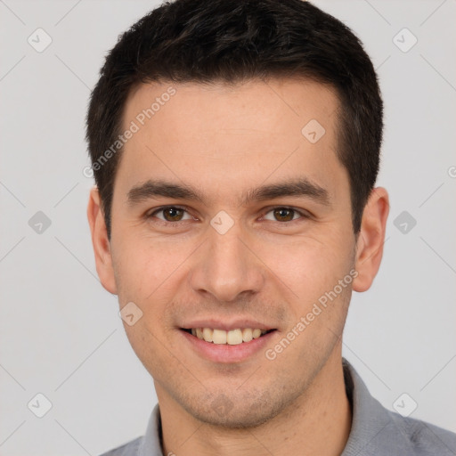 Joyful white young-adult male with short  brown hair and brown eyes