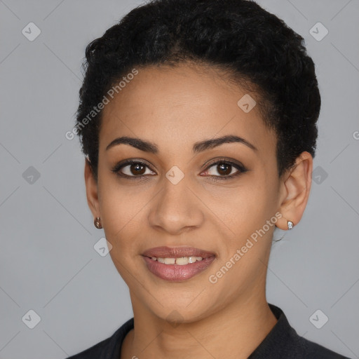 Joyful latino young-adult female with short  black hair and brown eyes