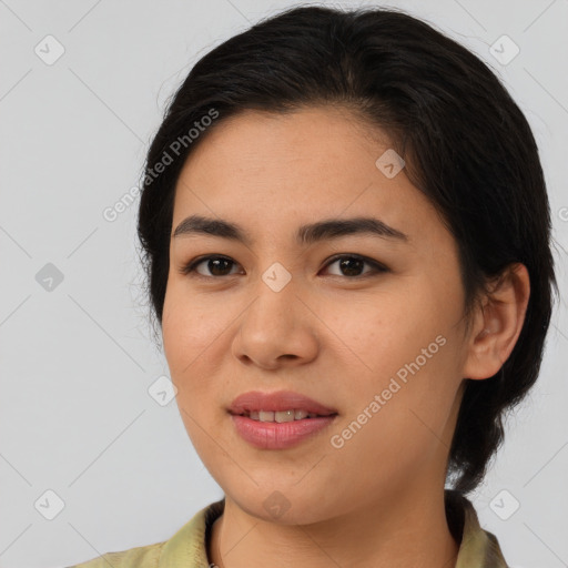 Joyful asian young-adult female with medium  brown hair and brown eyes