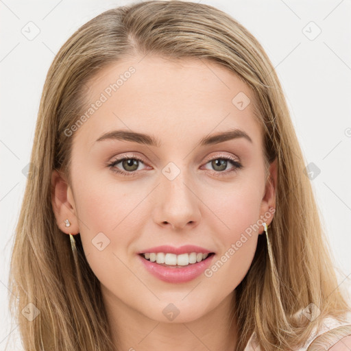 Joyful white young-adult female with long  brown hair and blue eyes