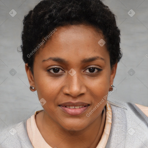 Joyful black young-adult female with short  brown hair and brown eyes