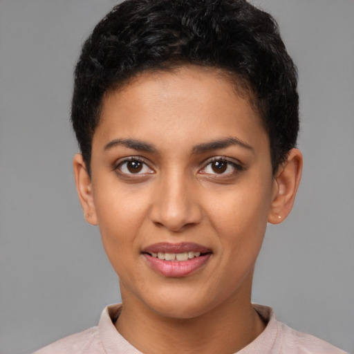 Joyful latino young-adult female with short  brown hair and brown eyes