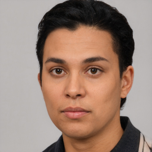 Neutral latino young-adult male with short  black hair and brown eyes