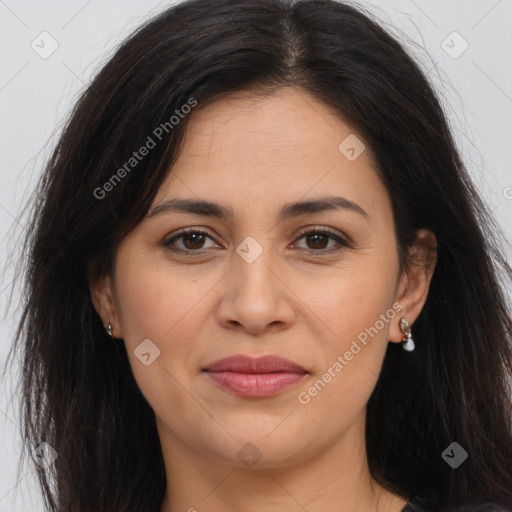 Joyful white adult female with long  brown hair and brown eyes