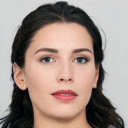 Neutral white young-adult female with long  black hair and brown eyes