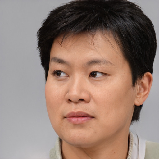 Neutral asian young-adult male with short  brown hair and brown eyes