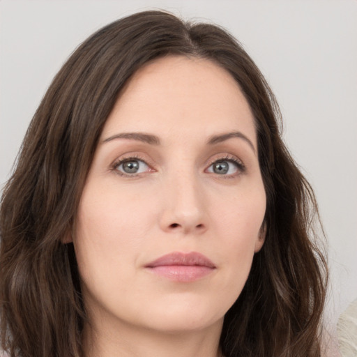 Neutral white young-adult female with long  brown hair and grey eyes