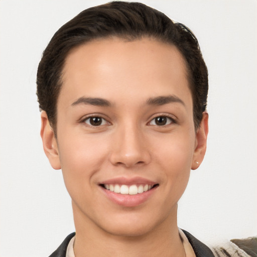 Joyful white young-adult female with short  brown hair and brown eyes