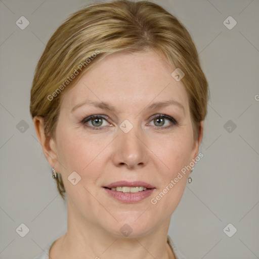 Joyful white adult female with medium  brown hair and grey eyes