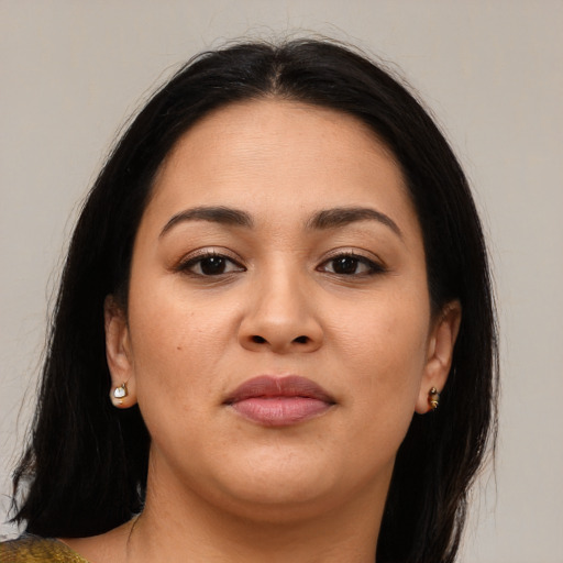 Joyful asian young-adult female with medium  brown hair and brown eyes