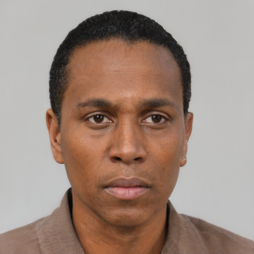 Neutral black adult male with short  black hair and brown eyes