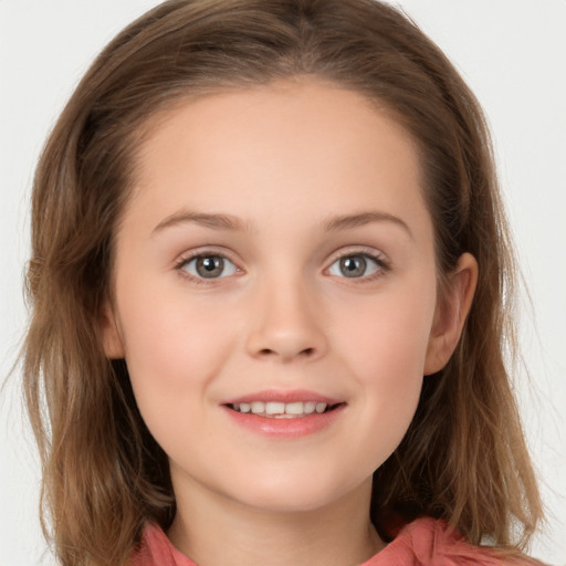 Joyful white child female with long  brown hair and brown eyes