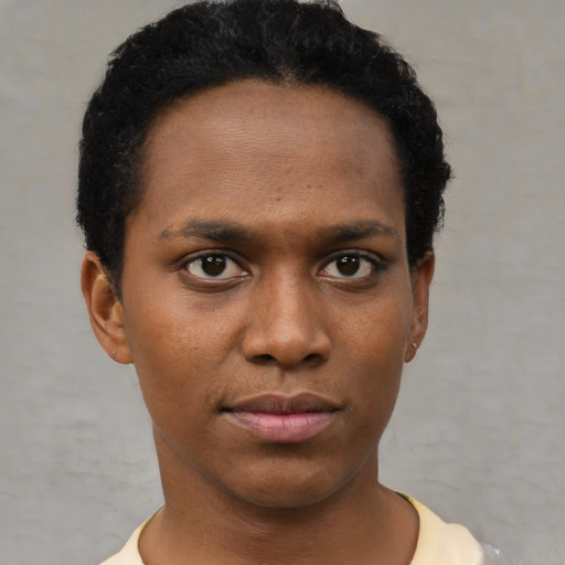 Neutral black young-adult female with short  black hair and brown eyes