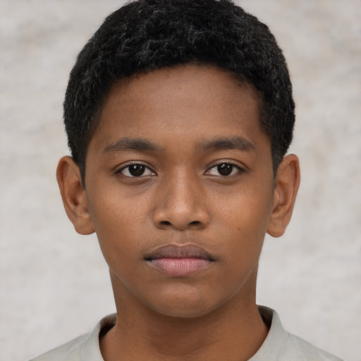 Neutral black child male with short  black hair and brown eyes
