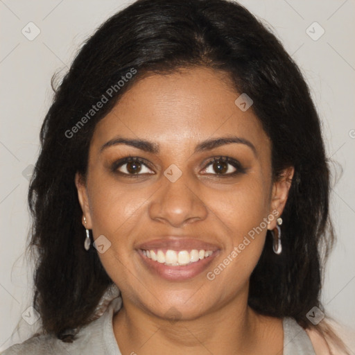 Joyful black young-adult female with medium  brown hair and brown eyes