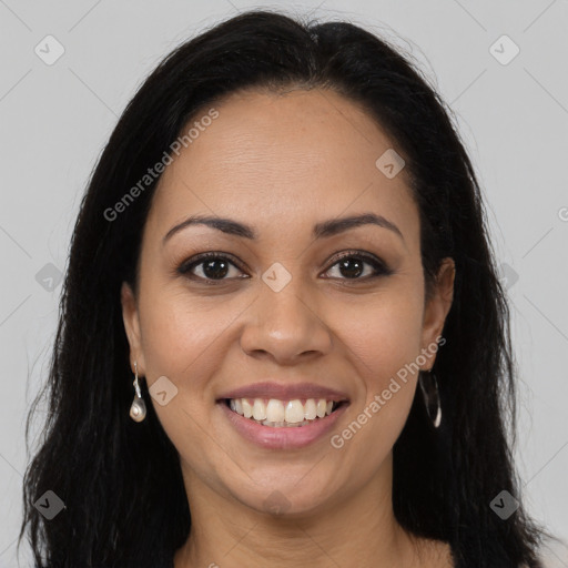 Joyful latino young-adult female with long  brown hair and brown eyes