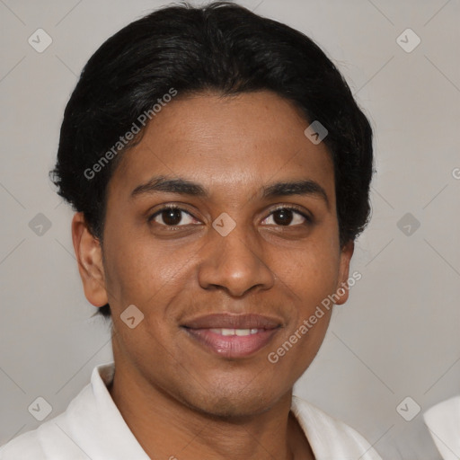 Joyful latino young-adult male with short  brown hair and brown eyes