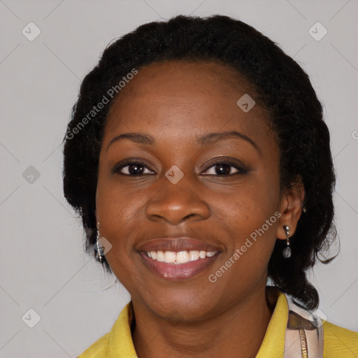 Joyful black young-adult female with medium  black hair and brown eyes