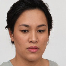 Neutral asian young-adult female with short  brown hair and brown eyes