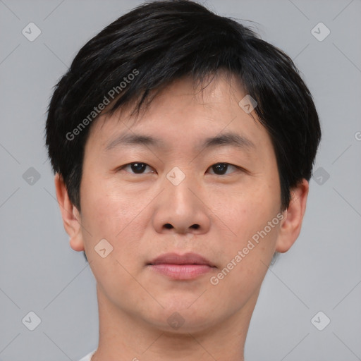 Neutral asian young-adult male with short  black hair and brown eyes