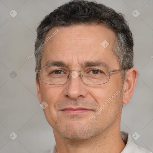 Joyful white middle-aged male with short  brown hair and brown eyes