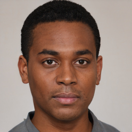 Neutral black young-adult male with short  black hair and brown eyes