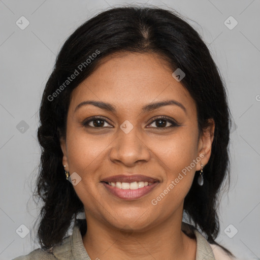 Joyful black young-adult female with medium  brown hair and brown eyes
