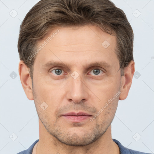 Neutral white adult male with short  brown hair and brown eyes