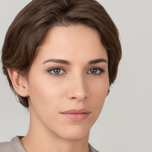 Neutral white young-adult female with short  brown hair and brown eyes