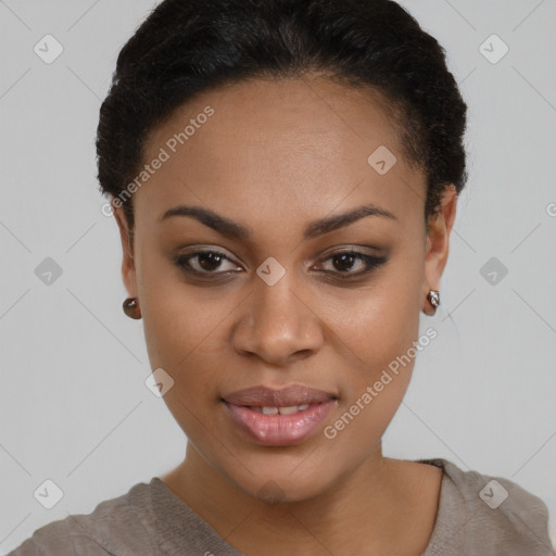 Joyful black young-adult female with short  brown hair and brown eyes