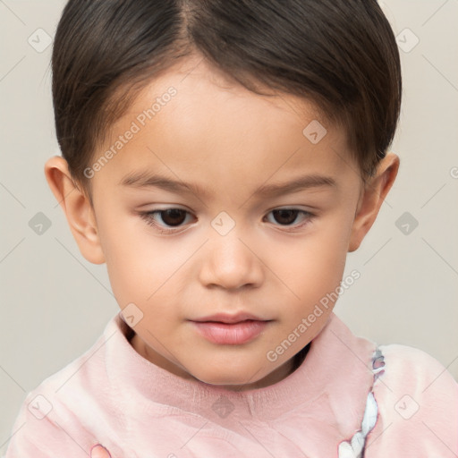 Joyful white child male with short  brown hair and brown eyes